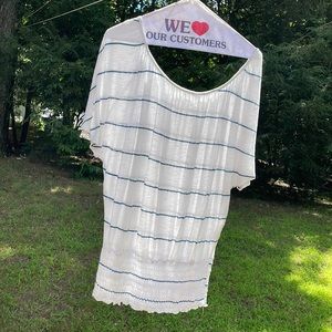 A large which is a bit small-the color is white and blue